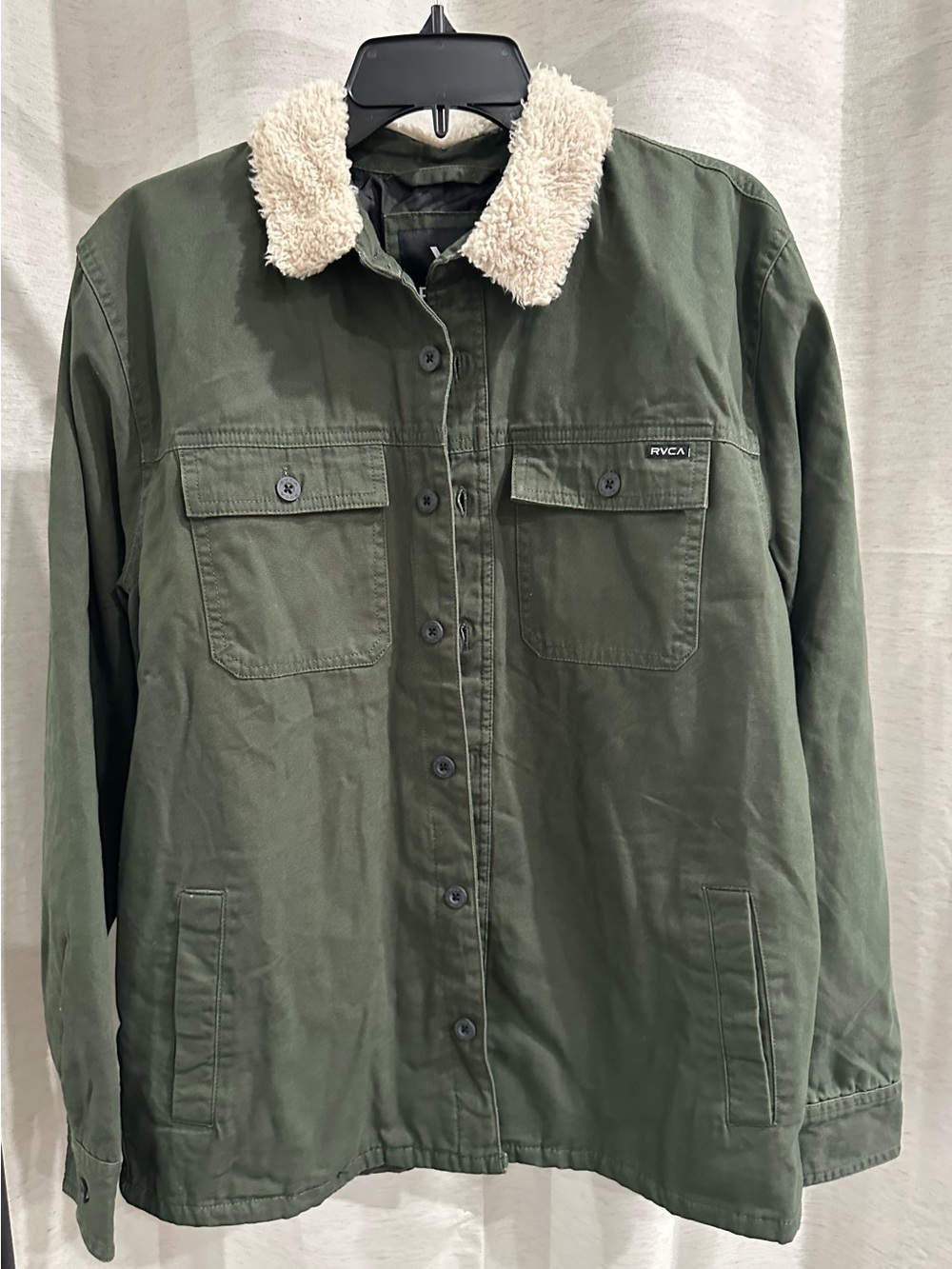 RVCA Range Jacket in an army/olive green with Cream Sherpa Collar